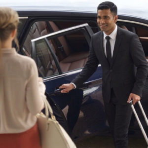 Driver picking up passenger from the airport
